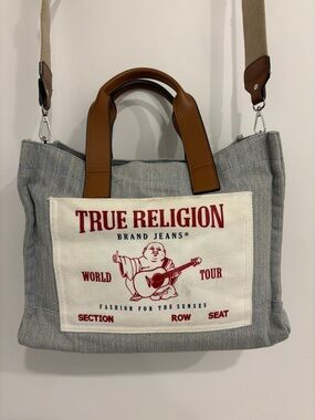 True Religion Light Blue Denim Tote with Brown Handles and Red Logo Patch